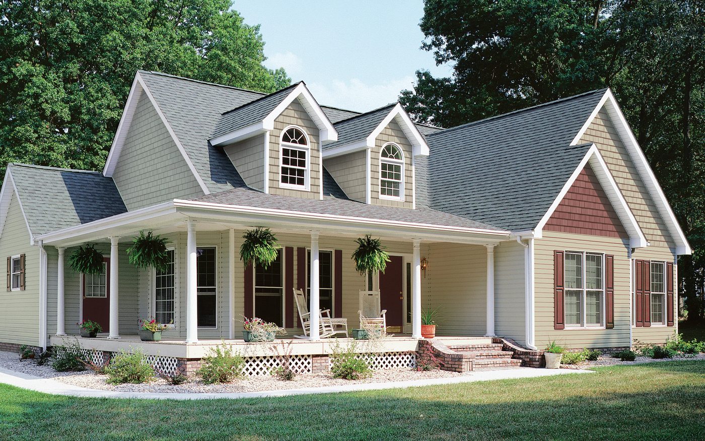 Home with CertainTeed Monogram vinyl lap siding and a covered front porch